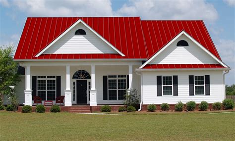 white house with dark red metal roof|sloped roof fbi.